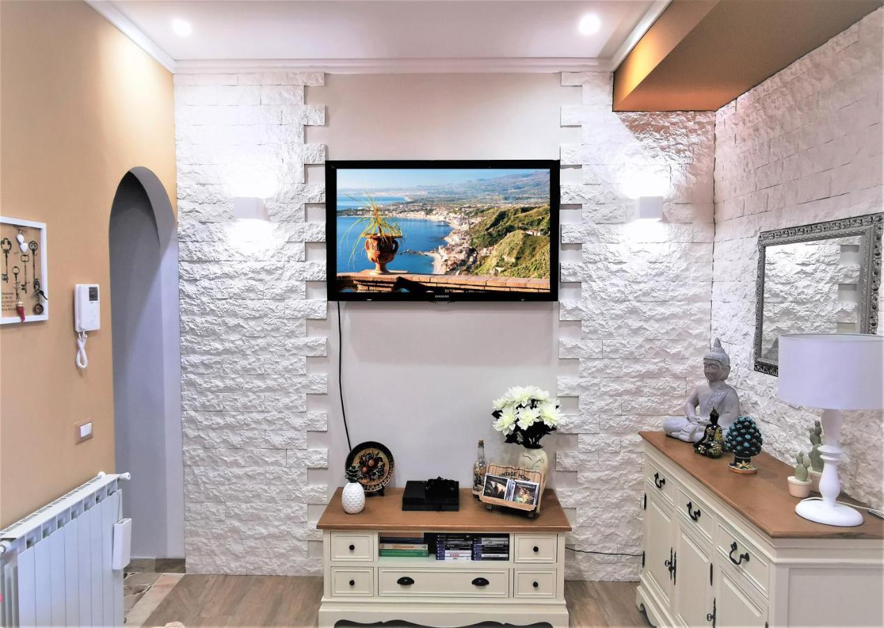 Casa Le Maioliche Apartment จีอาร์ดีนี นักซอส ภายนอก รูปภาพ